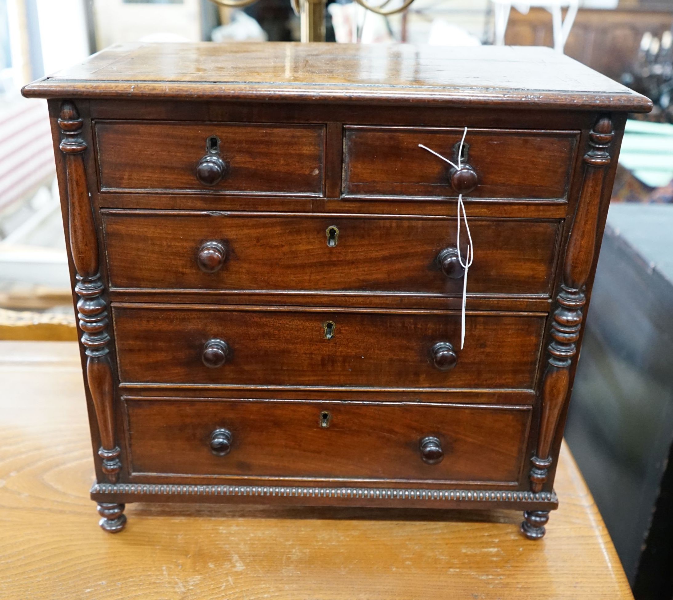 A Victorian banded mahogany miniature chest, width 43cm, depth 24cm, height 41cm